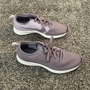 Purple Nike running shoes